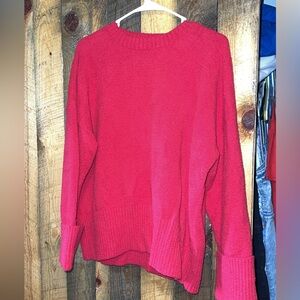 Bright red sweater